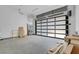 Large garage with a frosted glass door for privacy and natural light at 563 Rock Peak Dr, Henderson, NV 89012