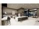 Spacious kitchen with multiple islands, ample seating, and modern appliances at 563 Rock Peak Dr, Henderson, NV 89012