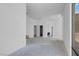 Bright living room with access to other rooms is spacious and airy at 563 Rock Peak Dr, Henderson, NV 89012