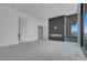 Living room featuring a modern fireplace, abundant natural light, and contemporary design at 563 Rock Peak Dr, Henderson, NV 89012