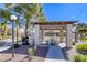 Outdoor barbecue area with seating and grill, ideal for gatherings in a landscaped common area at 5751 E Hacienda Ave # 243, Las Vegas, NV 89122
