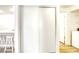 Hall closet with double sliding doors, providing practical storage solutions in a bright living space at 5751 E Hacienda Ave # 243, Las Vegas, NV 89122