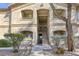 Inviting two-story condo complex featuring stucco exterior and well-maintained landscaping at 5751 E Hacienda Ave # 243, Las Vegas, NV 89122
