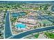 Community recreation center featuring a pool, bocce ball, and tennis courts in a desert landscape at 6076 Wheat Penny Ave, Las Vegas, NV 89122