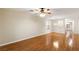 Spacious living room showcasing hardwood floors, natural light, and neutral paint, perfect for customization at 6076 Wheat Penny Ave, Las Vegas, NV 89122