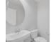 Modern powder room featuring a sleek pedestal sink and a clean, minimalist design at 6276 Desert Orchid Way, Las Vegas, NV 89141