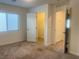 Bedroom with natural light coming from large windows and connecting doors at 629 Soaring Wings Ave, Las Vegas, NV 89183