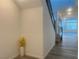 Entryway with hardwood flooring, vase with flowers, and staircase to the upper level at 629 Soaring Wings Ave, Las Vegas, NV 89183