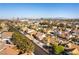 Expansive aerial view of a residential neighborhood with the Las Vegas skyline in the background at 6509 Vicuna Dr, Las Vegas, NV 89146