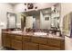 Clean bathroom featuring a double vanity with matching cabinets at 6509 Vicuna Dr, Las Vegas, NV 89146
