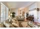 Bright living room showcases vaulted ceilings, natural light, and an open floor plan at 6509 Vicuna Dr, Las Vegas, NV 89146