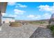 Expansive patio with comfortable seating and stunning views of the surrounding landscape at 658 Falcon Summit Ct, Henderson, NV 89012