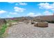 Outdoor seating area offering panoramic views of the mountains and city at 658 Falcon Summit Ct, Henderson, NV 89012