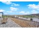 Backyard patio featuring comfortable seating and picturesque views of the landscape at 658 Falcon Summit Ct, Henderson, NV 89012