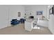 Well-lit home office featuring built-in storage and comfortable seating at 658 Falcon Summit Ct, Henderson, NV 89012
