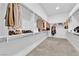 Spacious walk-in closet with custom shelving, providing ample storage at 658 Falcon Summit Ct, Henderson, NV 89012