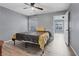 Bedroom with ceiling fan, natural light, and an open door to another room at 6800 E Lake Mead Blvd # 1033, Las Vegas, NV 89156