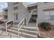 Multi-Gathering residential building with stairs leading up to the units at 6800 E Lake Mead Blvd # 1033, Las Vegas, NV 89156