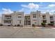 Multi-Gathering apartment building with parking lot and beige stucco facade at 6800 E Lake Mead Blvd # 1033, Las Vegas, NV 89156