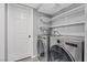 Modern laundry room featuring new front load washer and dryer at 6800 E Lake Mead Blvd # 1033, Las Vegas, NV 89156