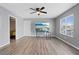 Living room with updated flooring, ceiling fan, a bright window and neutral walls at 6800 E Lake Mead Blvd # 1033, Las Vegas, NV 89156