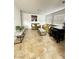 Open living area with tile floors, neutral paint, and an abundance of natural light at 727 Pickled Pepper Pl, Henderson, NV 89011