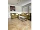 Cozy living room offering tile flooring and comfortable seating for relaxing or entertaining guests at 727 Pickled Pepper Pl, Henderson, NV 89011