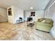 Bright living room featuring tile flooring, natural light, and neutral walls, ready for personalization at 727 Pickled Pepper Pl, Henderson, NV 89011