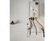 The water heater is a Rinnai tankless water heater at 727 Pickled Pepper Pl, Henderson, NV 89011