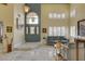 Grand foyer featuring high ceilings, marble floors, and an elegant front door entrance at 7613 Hackensack Ct, Las Vegas, NV 89128