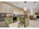 Bright kitchen with an island, stainless steel appliances, and a marble floor at 7613 Hackensack Ct, Las Vegas, NV 89128