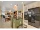 Bright kitchen showcasing modern appliances, an island, and a marble floor at 7613 Hackensack Ct, Las Vegas, NV 89128