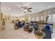 Spacious living room with an open floor plan, marble floors, and abundant natural light at 7613 Hackensack Ct, Las Vegas, NV 89128