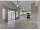 Open-concept layout blending the kitchen and dining area with backyard access at 8121 Heavenly Star Cir, Las Vegas, NV 89128