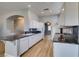 Modern kitchen with granite countertops, white cabinetry, and stainless appliances at 8232 Sedona Sunset Dr, Las Vegas, NV 89128
