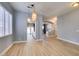 Bright living area featuring modern lighting, fresh paint, and an inviting open layout at 8232 Sedona Sunset Dr, Las Vegas, NV 89128