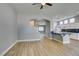 Light-filled living space with access to the kitchen and dining areas at 8232 Sedona Sunset Dr, Las Vegas, NV 89128