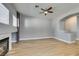 Open living area showcasing a fireplace, neutral paint, and seamless transitions to other rooms at 8232 Sedona Sunset Dr, Las Vegas, NV 89128
