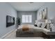 Bright bedroom with large windows and neutral decor at 8232 Sedona Sunset Dr, Las Vegas, NV 89128