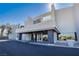 Modern building exterior with 'Park House' signage, sleek architectural details, and a covered entrance at 8925 W Flamingo Rd # 228, Las Vegas, NV 89147