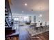 Modern dining room with large windows, stylish furniture and decor for a bright, open space at 8925 W Flamingo Rd # 228, Las Vegas, NV 89147