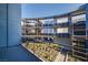 This building offers metal roofs, modern design, and open-air walkways with glass railings at 8925 W Flamingo Rd # 228, Las Vegas, NV 89147