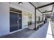 Modern building hallway with a walkway, unit entrances, and contemporary design elements at 8925 W Flamingo Rd # 228, Las Vegas, NV 89147