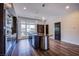 Stylish kitchen featuring dark cabinets and stainless steel appliances at 8925 W Flamingo Rd # 228, Las Vegas, NV 89147