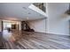 Large living room with stairs, hard surface floors, and an open floor plan at 8925 W Flamingo Rd # 228, Las Vegas, NV 89147