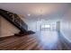 This living room features stairs, hard surface floors, and lots of natural light at 8925 W Flamingo Rd # 228, Las Vegas, NV 89147