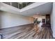 Spacious living room featuring hard surface floors, high ceilings, and an open floor plan at 8925 W Flamingo Rd # 228, Las Vegas, NV 89147