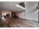 Spacious, modern living room with wood floors, an open layout, and contemporary finishes at 8925 W Flamingo Rd # 228, Las Vegas, NV 89147