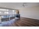 Second-story loft showcasing large windows and laminate flooring for abundant natural light at 8925 W Flamingo Rd # 228, Las Vegas, NV 89147