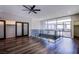 Second story loft area, hardwood flooring, and lots of natural light from a large window at 8925 W Flamingo Rd # 228, Las Vegas, NV 89147